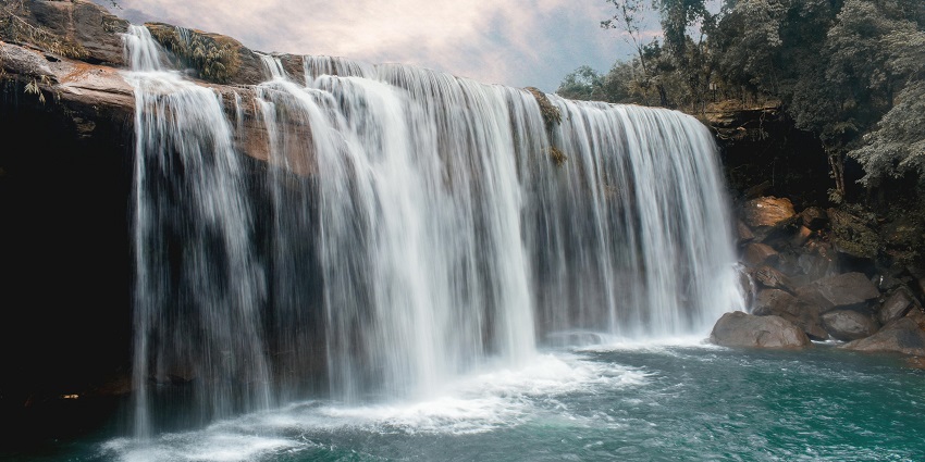Witness the sparkling water beating down the rocks into the vibrant stream