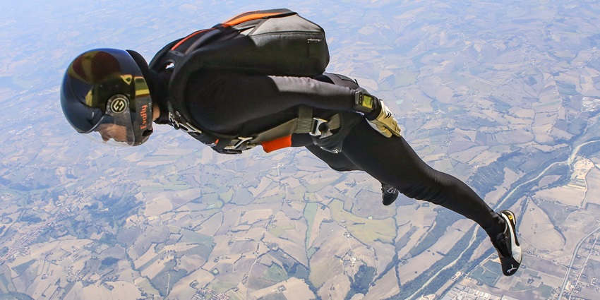 Skydivers descend rapidly, showcasing advanced techniques and control - Skydiving Malaysia