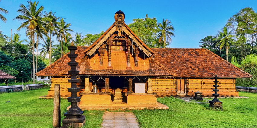 A picture of a traditional Hindu temple showcasing its medieval architectural elements