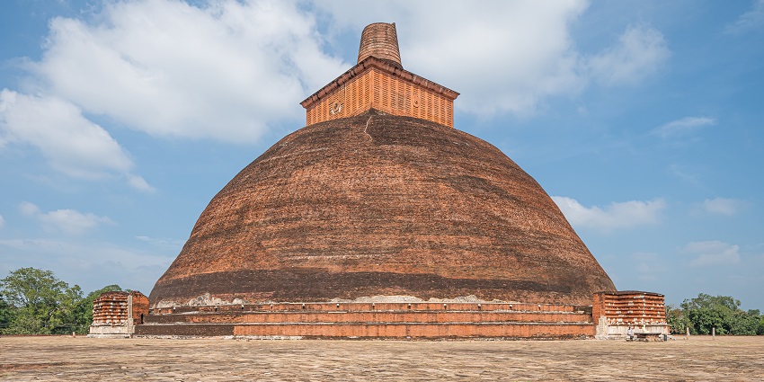 View of the Jetavanaramaya Stupa in Anuradhapura, showcasing its towering structure.