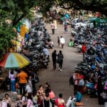 A picture representing a section of the market that witnesses many visitors every day.