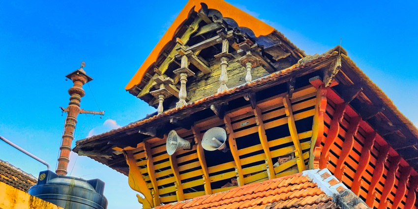 A picture of a traditional Hindu temple in Andhra Pradesh under a clear blue sky
