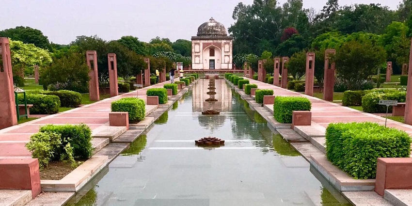 Sunder Nursery is a teeming public space with manicured lawns, water features, and various floral arrangements.
