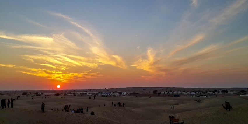 A picturesque sunset mesmerises all the tourists into the serenity and lap of nature.