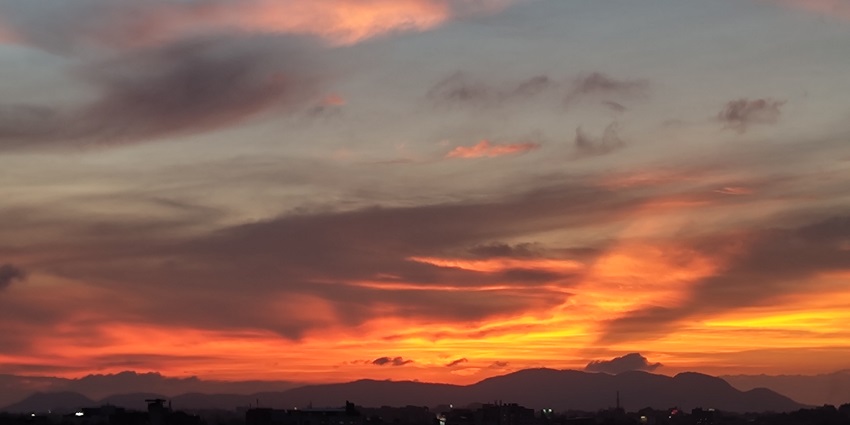Guwahati sunset casting a golden hue over the city, marking the harvest festival of Assam.