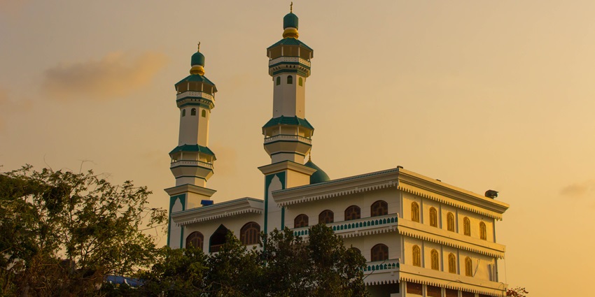 Sunset view from a mosque, with the sky painted in vibrant hues - Mosques in Kerala