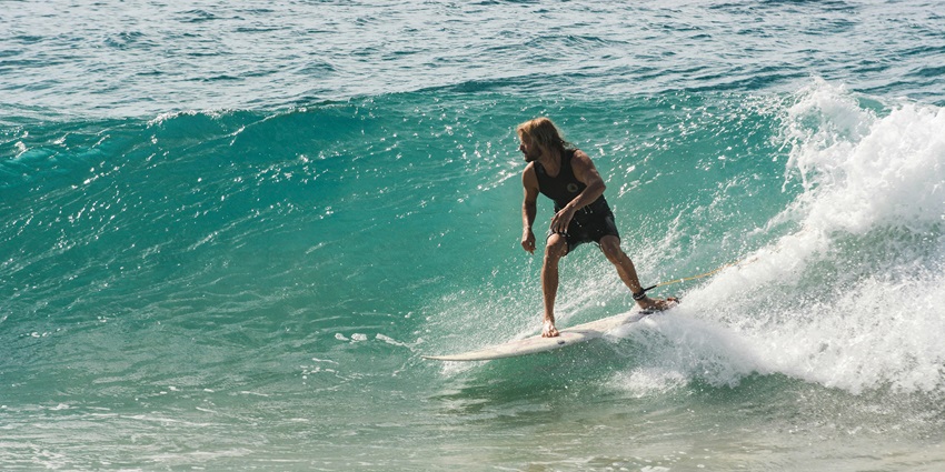 Surfing is one of the most exhilarating things to do in Maldives for adventurers.