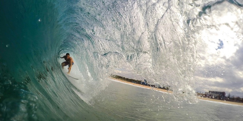 Enjoy the exciting surfing experience which is one of the watersports in Phuket.