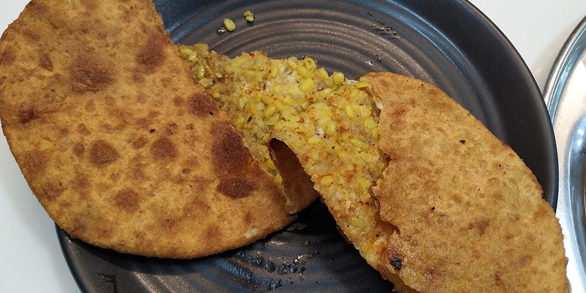 Dal parantha served hot at Paranthe Wali Gali, Chandni Chowk, with rich golden crust.