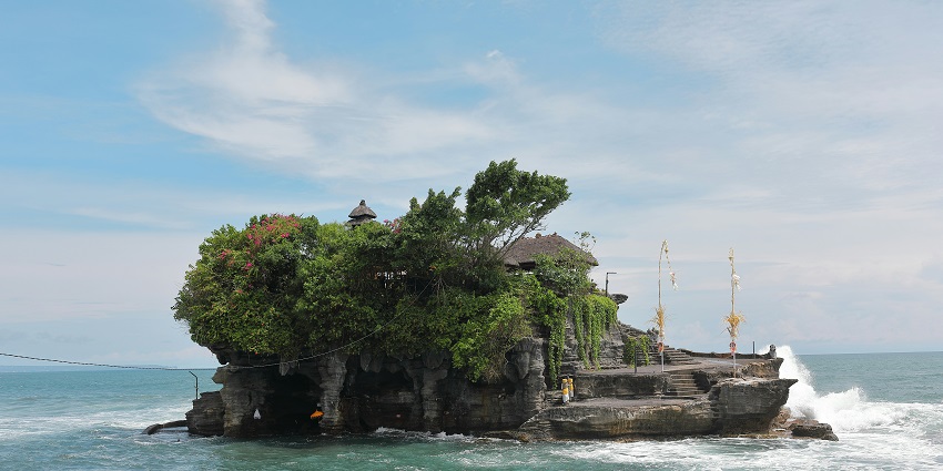 Tanah Lot Temple is one of the most revered Indonesia temples on the sea for travellers.