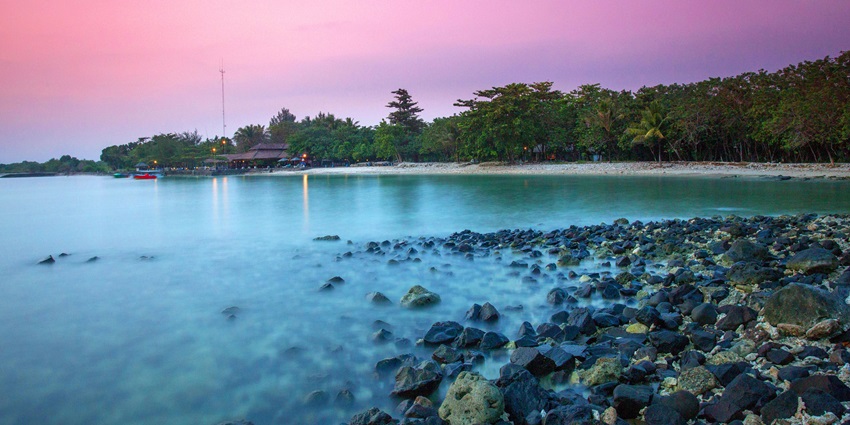 Tanjung Lesung Beach is breathtaking natural beauty with rocky shores and lush flora