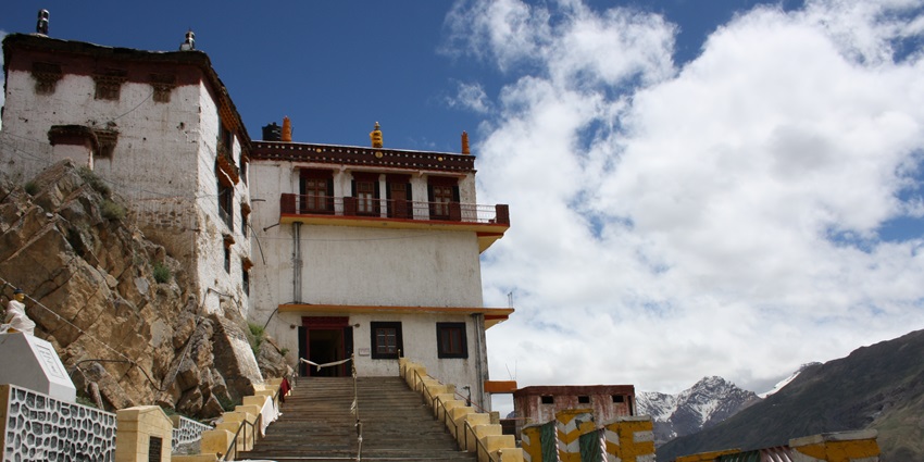 A picture of the entrance of a monastery in Palampur with stairs leading to the top