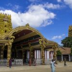 Front entrance of Nallur Temple, showcasing intricate carvings and vibrant colors.