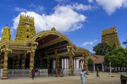 Front entrance of Nallur Temple, showcasing intricate carvings and vibrant colors.