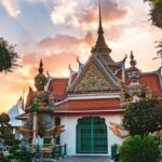 Facade of a temple, featuring intricate carvings - places to visit in Bangkok for couples.