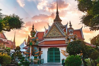 Facade of a temple, featuring intricate carvings - places to visit in Bangkok for couples.