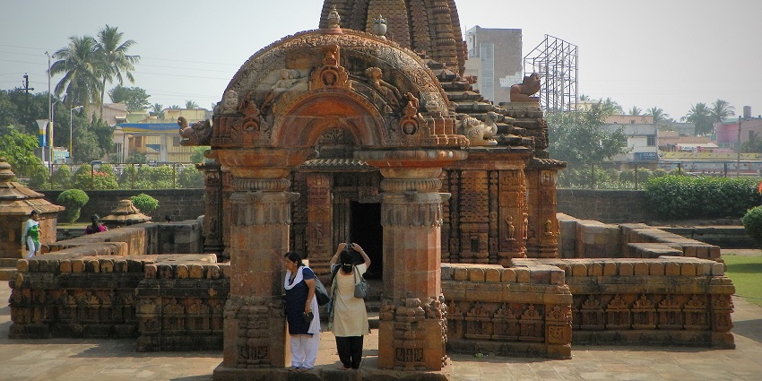 Image of a temple with decorative torana - one of the best places to visit in Silchar