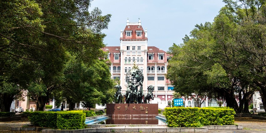 Main entrance of Guangzhou Grand World Scenic Park with decorative architecture.