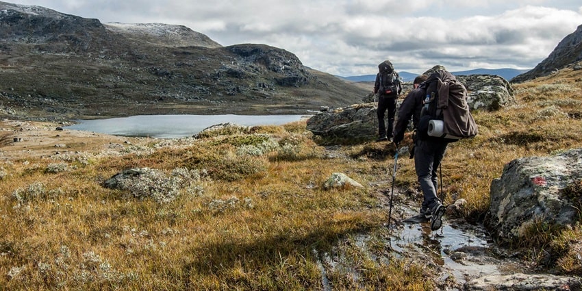 People hiking at the Seven Lakes, one of the top spots for trekking in Arunachal Pradesh.