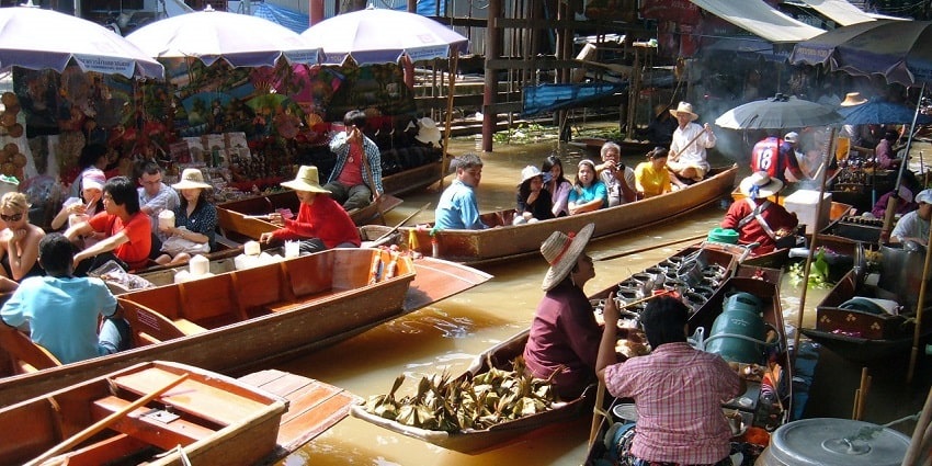 Shop at the floating markets, as one of the things to do in Bangkok with family.