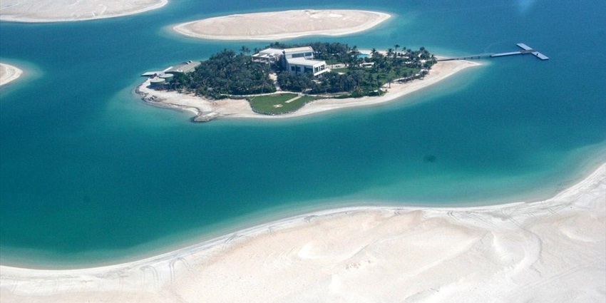 Sparkling turquoise water of the World islands in Dubai offering a mesmerising view