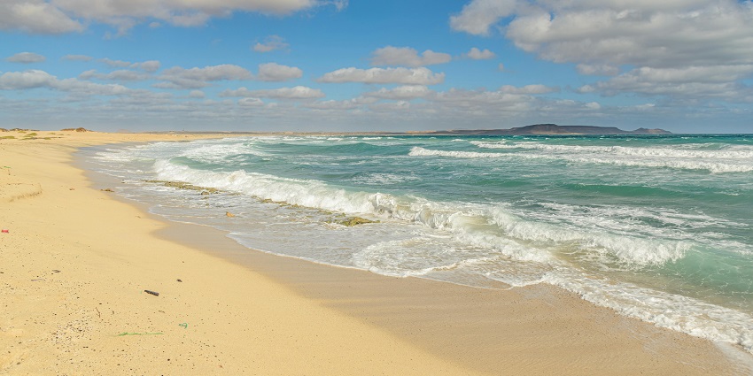 A mesmerising view of shimmering waters meeting the golden sands at the Thinh Long.