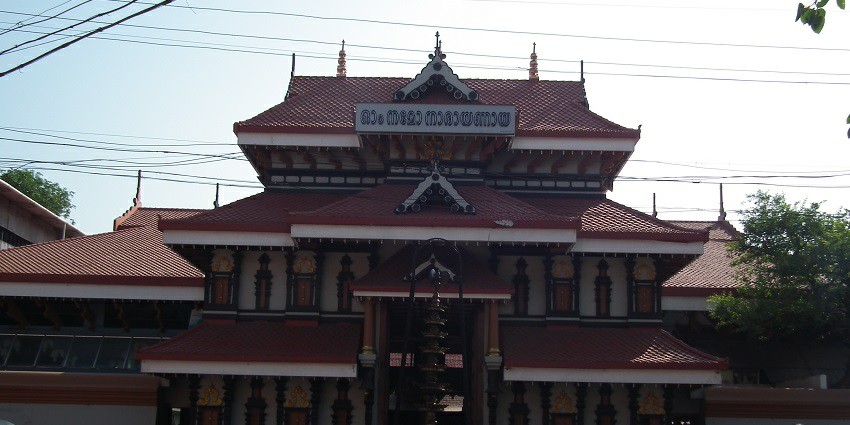A frontal view of a Krishna temple in Thrissur with a traditional architecture