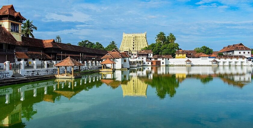 A beautiful lakeside view of a temple in Trivandrum