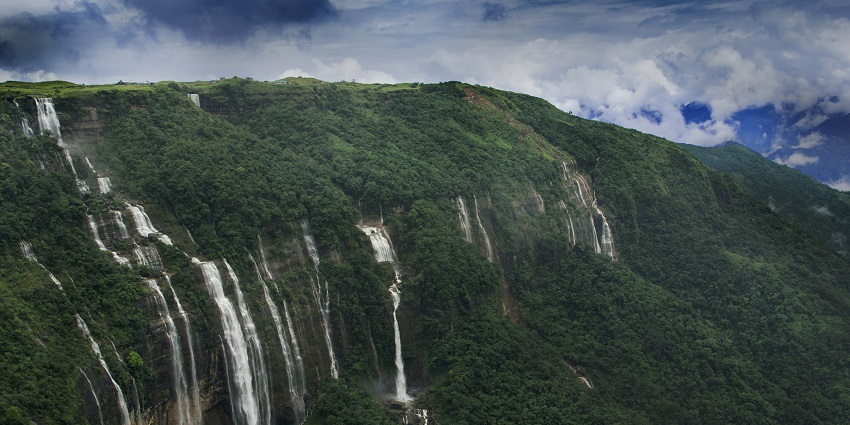 Witness the grandiose of this waterfall, cascading at different levels amidst the lush forests