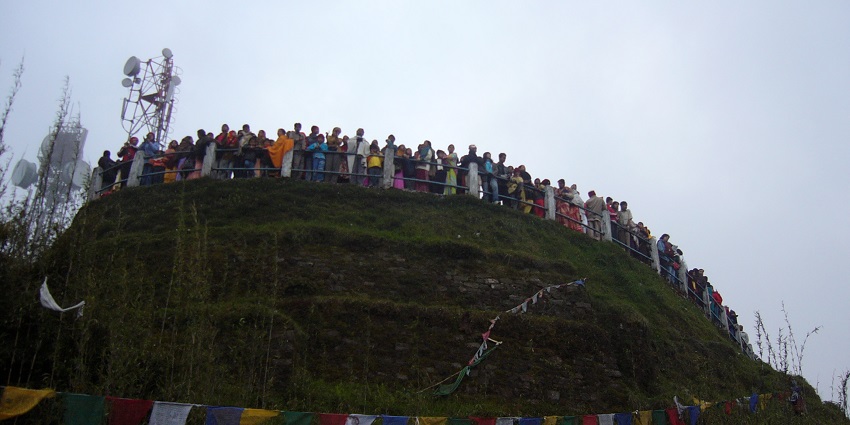 Tourists looking over from the Tiger hill darjeeling, a tourist attractions that offers many enchanting views