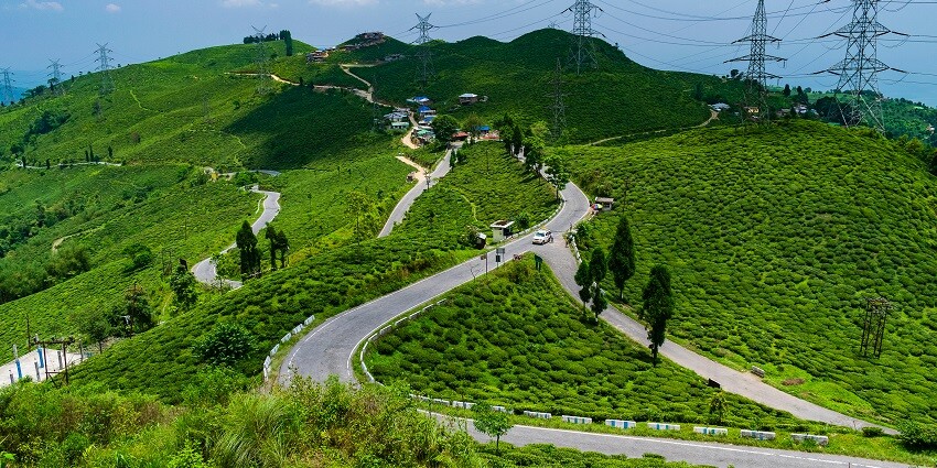 The scenic hills and curvy roads at Tingling View Point, a place to visit in Mirik.