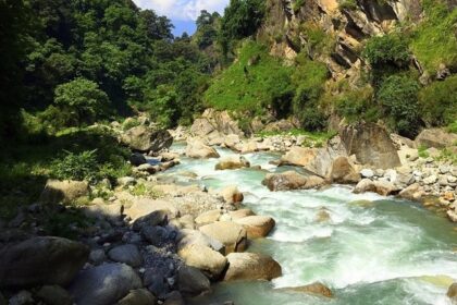 A serene riverside campsite in Tirthan Valley, in the state of Himachal Pradesh, India.