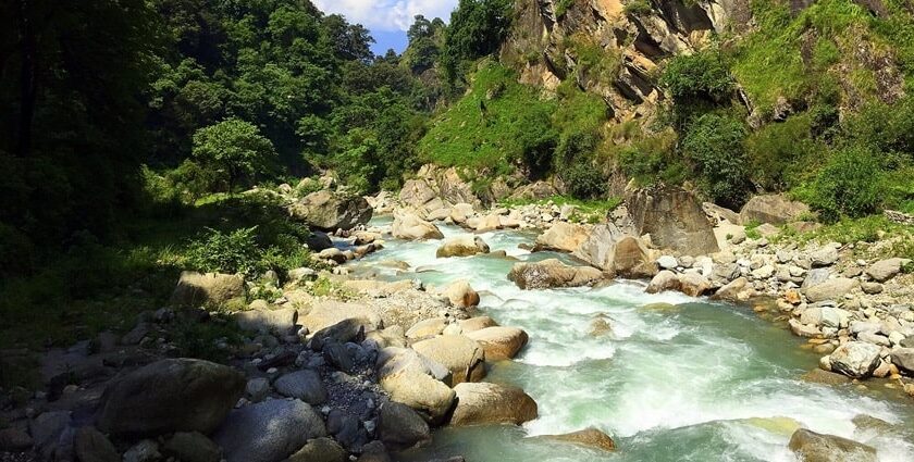 A serene riverside campsite in Tirthan Valley, in the state of Himachal Pradesh, India.