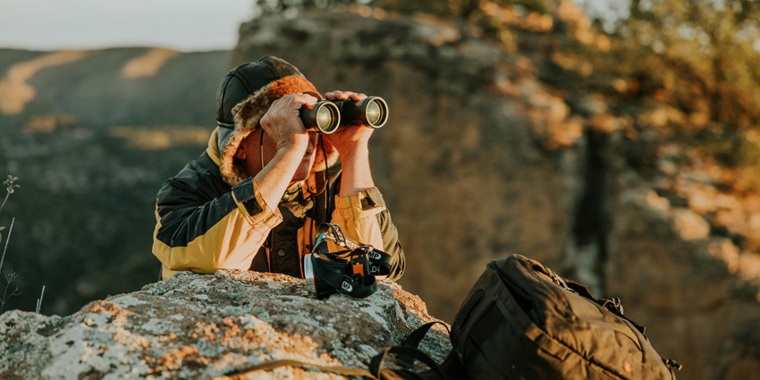Tourist observing surroundings in national park