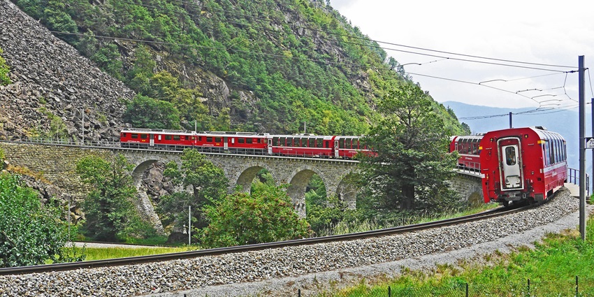 Scenic snapshot of a train passing through a hill city around Dibang Wildlife Sanctuary