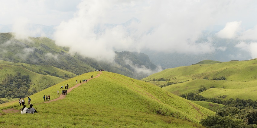 People climbing a mountain trail