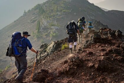 A view of people making their way through the steep slopes relishing the surroundings.