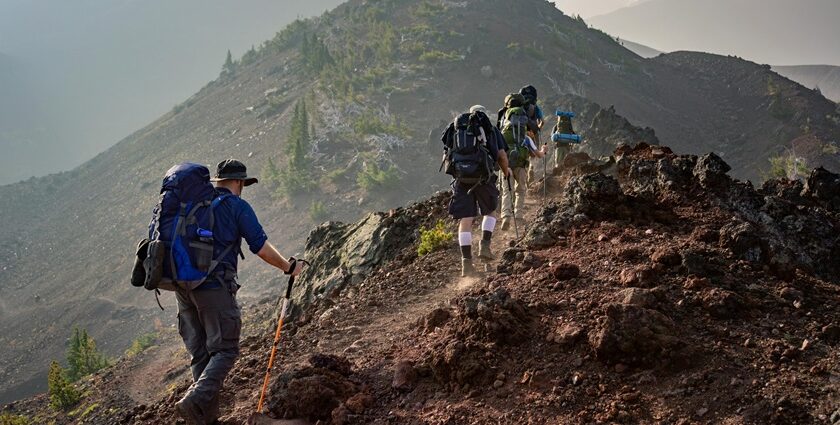 A view of people making their way through the steep slopes relishing the surroundings.