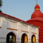 Tripureswari Temple , with its ancient architecture and vibrant religious decorations