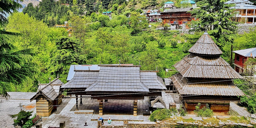 Scenic picture of the Tripura Sundari Temple amidst the dense hills and the forest