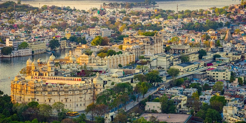 Udaipur is one of the places to visit in monsoon near Delhi with its dense green hills