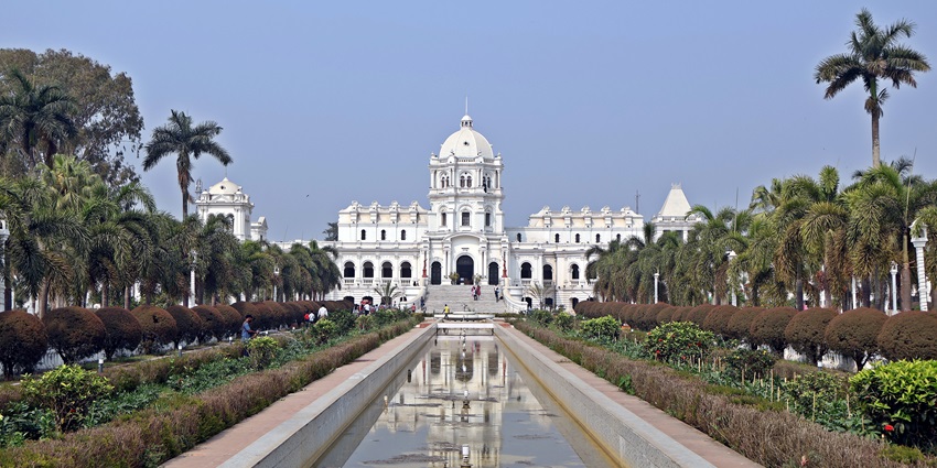 Ujjayanta Palace viewed symmetrically from its central avenue framed by gardens