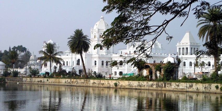 Scenic Ujjayanta Palace, with its beautiful architecture mirrored in the calm lake waters
