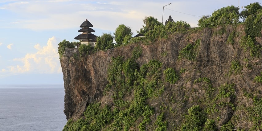 The enchanting snapshot of the beautiful a shrine on the clif in the Uluwatu, Bali