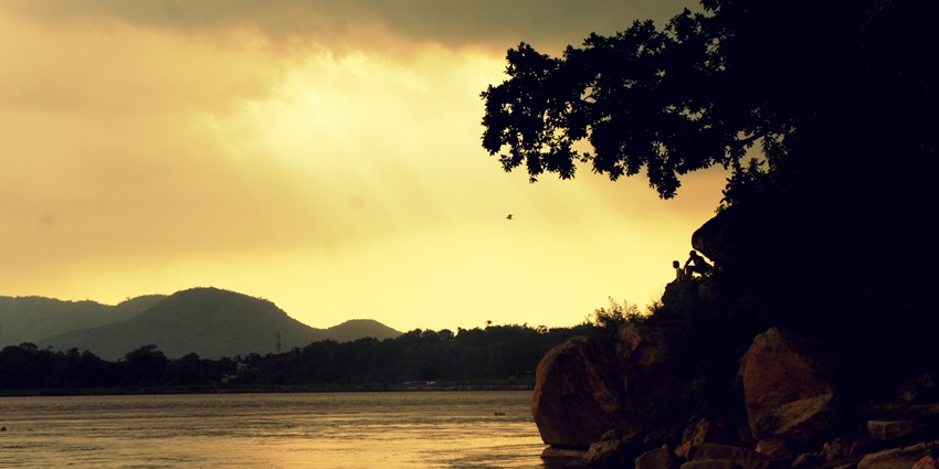 Picturesque view from ferry beside Umananda Temple and sunset - things to do in Guwahati