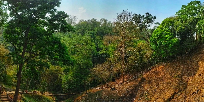 Scenic image of lush Unakoti Archaeological site near the Clouded Leopard National Park