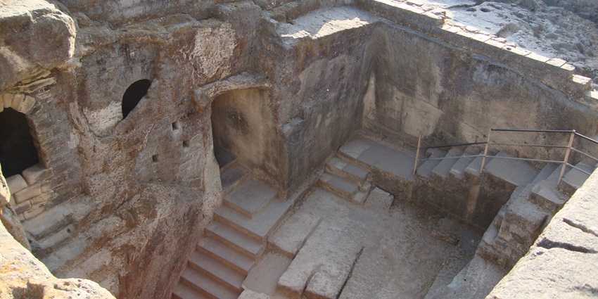 A picture of an intriguing historical cave setting in Uttarakhand with multi-level interiors