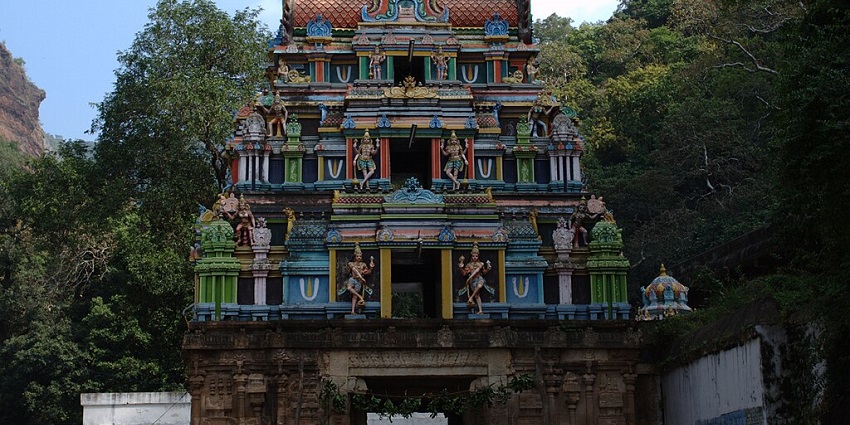 Sunning view of the Upper Ahobilam temple's ornate gopuram against a clear blue sky.