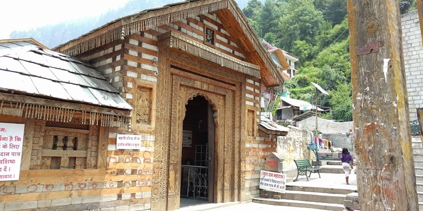 Beautiful image of the historic vashisht temple and the natural hot springs in Manali