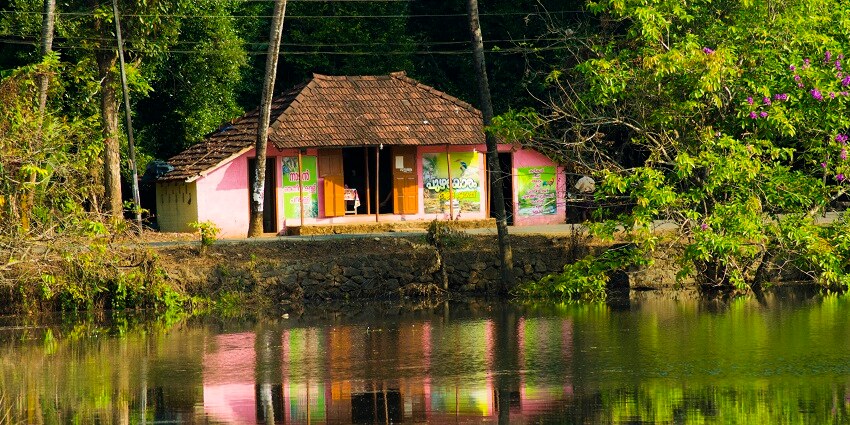 Snapshot of the shop across the waterbody somewhere in Kerala–New Year party in Trivandrum